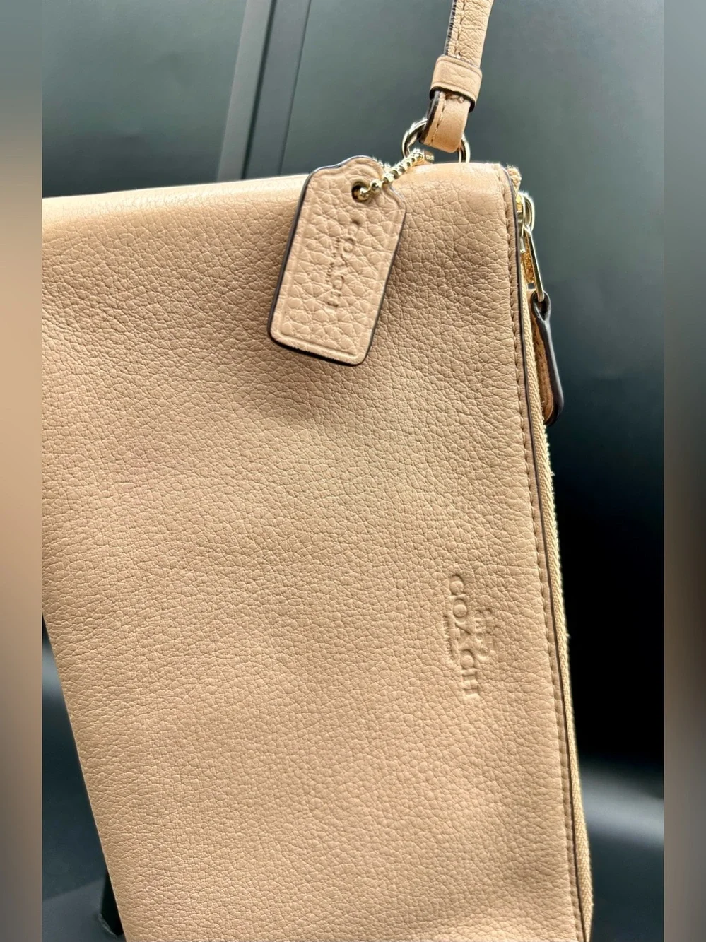 COACH Pebble Leather Double - Zip Wristlet in a neutral tan - Gold-Tone Hardware